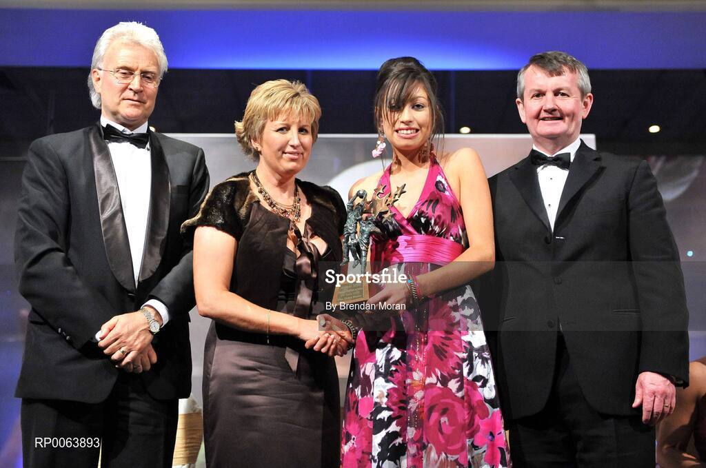 15 November 2008; Aine O'Leary of Cork, is presented with the Munster Young Player of the Year by Geraldine Giles, President, Cumann Peil na mBan, in the company of, from left, Tony Towell, O'Neills, and Pol O Gallchoir, Ceannsai, TG4. TG4 O'Neill's Ladies Football All-Stars Awards, Citywest Hotel, Dublin. Picture credit: Brendan Moran / SPORTSFILE