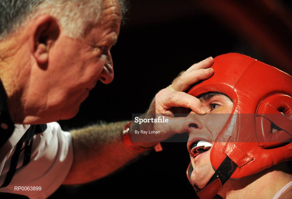 15 November 2008; Eric McDonnell, left stems the blood flow from Andrew McLoughlin's nose.TV3 Kildare GAA Fight Night, Time: bar + venue, Naas, Co. Kildare. Picture credit: Ray Lohan / SPORTSFILE  *** Local Caption ***