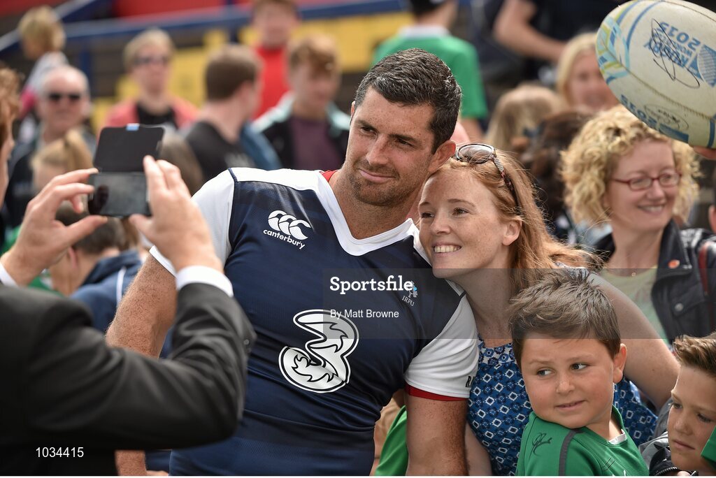 29 July 2015; Ireland's Rob Kearney poses for a photograph with Colette Murphy, from Cork City, after squad training. Irish Independent Park, Cork. Picture credit: Matt Browne / SPORTSFILE