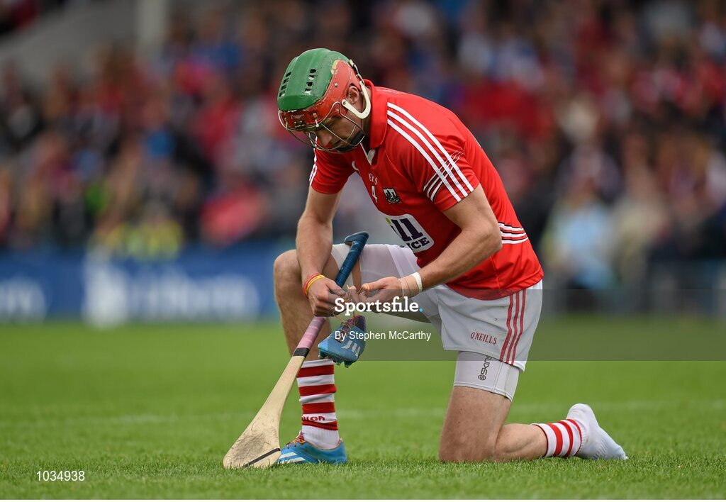 26 July 2015; Stephen McDonnell, Cork, puts on his boot. GAA Hurling All-Ireland Senior Championship, Quarter-Final, Galway v Cork. Semple Stadium, Thurles, Co. Tipperary. Picture credit: Stephen McCarthy / SPORTSFILE