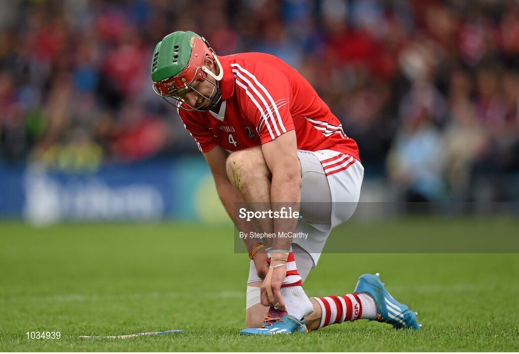 26 July 2015; Stephen McDonnell, Cork, puts on his boot. GAA Hurling All-Ireland Senior Championship, Quarter-Final, Galway v Cork. Semple Stadium, Thurles, Co. Tipperary. Picture credit: Stephen McCarthy / SPORTSFILE
