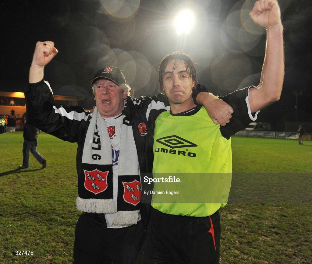 15 November 2008; The match's quadruple goal scorer  Robbie Farrell, Dundalk, celebrates with a supporter after winning the eircom League First Division Title, Kildare County v Dundalk, Station Road, Kildare. Picture credit: Damien Eagers / SPORTSFILE