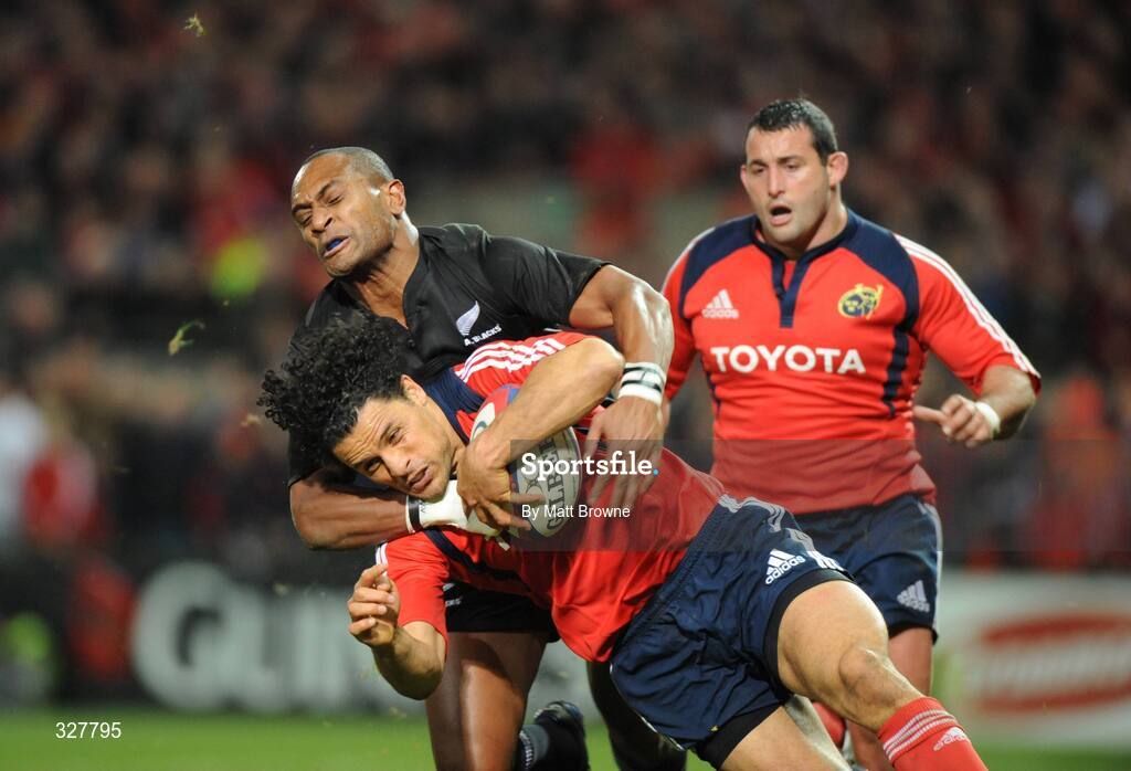 18 November 2008; Doug Howlett, Munster, is tackled by Joe Rokokoko, New Zealand. Zurich Challenge Match, Munster v New Zealand, Thomond Park, Limerick. Picture credit: Matt Browne / SPORTSFILE