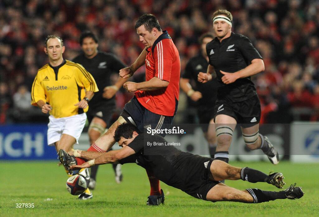 18 November 2008; James Coughlan, Munster, in action against Stephen Donald, New Zealand. Zurich Challenge Match, Munster v New Zealand, Thomond Park, Limerick. Picture credit: Brian Lawless / SPORTSFILE