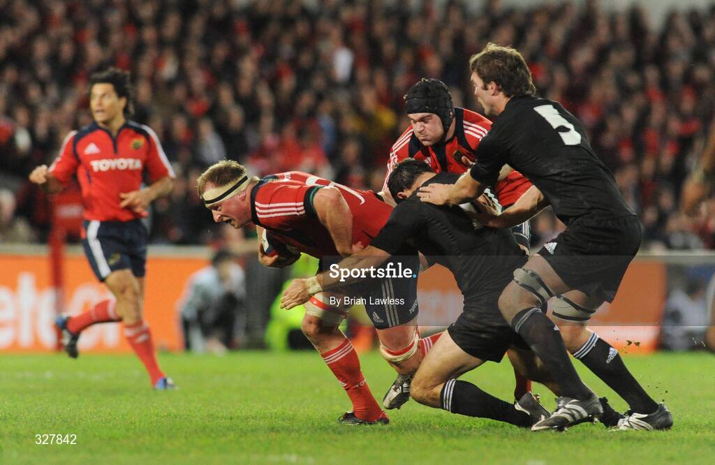 18 November 2008; Mick O'Driscoll, left, and Mark Melbourne, Munster, in action against Stephen Donald and Jason Eaton, right, New Zealand. Zurich Challenge Match, Munster v New Zealand, Thomond Park, Limerick. Picture credit: Brian Lawless / SPORTSFILE