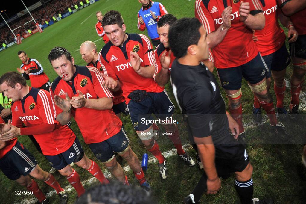 18 November 2008; The Munster players applaud the New Zealand players as they leave the pitch after the match. Zurich Challenge Match, Munster v New Zealand, Thomond Park, Limerick. Picture credit: Brian Lawless / SPORTSFILE
