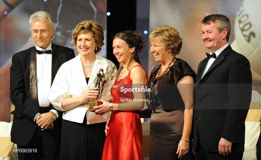 15 November 2008; Sharon Courtney of Monaghan, is presented with her All-Star award by President Mary McAleese, in the company of, from left, Tony Towell, O'Neills, Geraldine Giles, President, Cumann Peil na mBan and Pol O Gallchoir, Ceannsai, TG4. TG4 O'Neill's Ladies Football All-Stars Awards, Citywest Hotel, Dublin. Picture credit: Ray McManus / SPORTSFILE