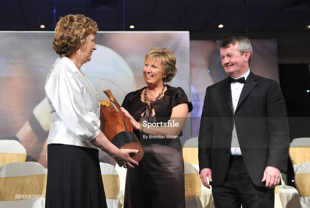 15 November 2008; Geraldine Giles, President, Cumann Peil Gael na mBan, in the company of Pol O Gallchoir, Ceannsai, TG4, makes a presentation to President Mary McAleese. TG4 O'Neill's Ladies Football All-Stars Awards, Citywest Hotel, Dublin. Picture credit: Brendan Moran / SPORTSFILE