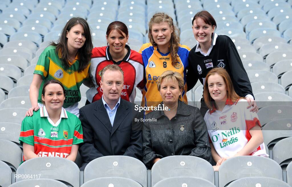 18 November 2008; Declan Moran, Director of Marketing and Business Development, Vhi Healthcare, with Geraldine Giles, Uachtaran Peil Gael na mBan, with players, clockwise from left, Michelle McGing, captain Carnacon, Co. Mayo, Fiona O'Neill, captain Kilmihil, Co. Clare, Lisa Ni Shuibhne, Ballingeary Inchigeela, Co. Cork, Aine Clarke, captain Knockmore, Co. Mayo, Sinead Mohan, captain Emyvale, Co. Monaghan, and Anne Marie Walsh, captain Inch Rovers, Co. Cork, ahead of the 2008 Vhi Healthcare All-Ireland Club Finals. The senior, intermediate and junior finals will take place over the coming two weekends. Croke Park, Dublin. Photo by Sportsfile