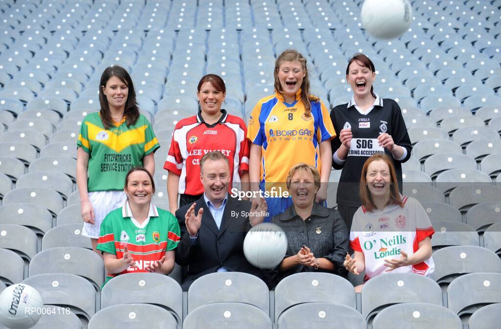 18 November 2008; Declan Moran, Director of Marketing and Business Development, Vhi Healthcare, with Geraldine Giles, Uachtaran Peil Gael na mBan, with players, clockwise from left, Michelle McGing, captain Carnacon, Co. Mayo, Fiona O'Neill, captain Kilmihil, Co. Clare, Lisa Ni Shuibhne, Ballingeary Inchigeela, Co. Cork, Aine Clarke, captain Knockmore, Co. Mayo, Sinead Mohan, captain Emyvale, Co. Monaghan, and Anne Marie Walsh, captain Inch Rovers, Co. Cork, ahead of the 2008 Vhi Healthcare All-Ireland Club Finals. The senior, intermediate and junior finals will take place over the coming two weekends. Croke Park, Dublin. Photo by Sportsfile