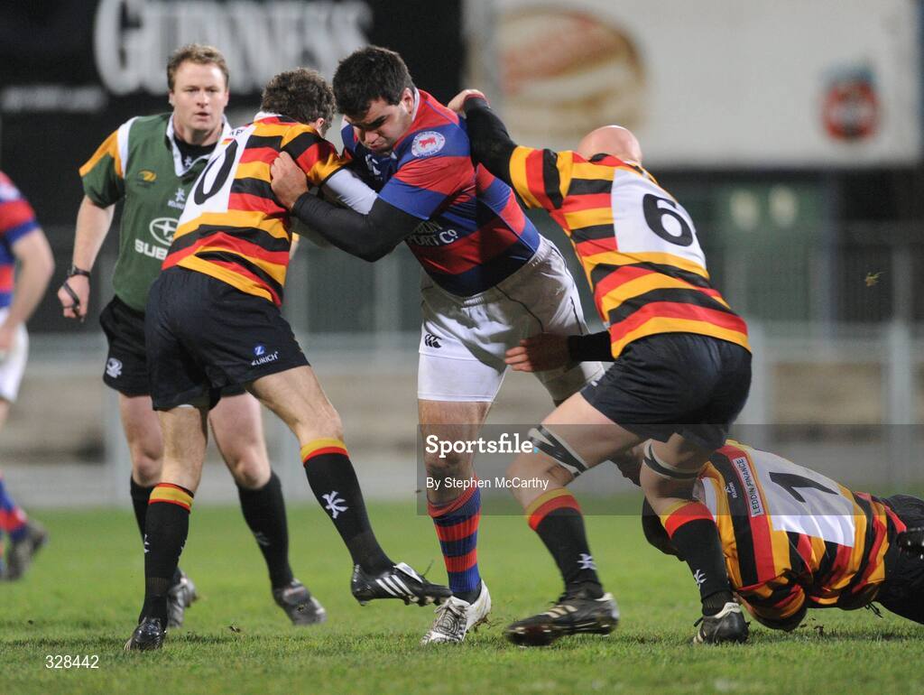21 November 2008; Martin Garvey, Clontarf, is tackled by David Hewitt, 10, Romain Liberman, 6, and Karl Cleere, Lansdowne. Leinster Senior League Cup Final, Clontarf v Lansdowne, Donnybrook Stadium, Dublin. Picture credit: Stephen McCarthy / SPORTSFILE