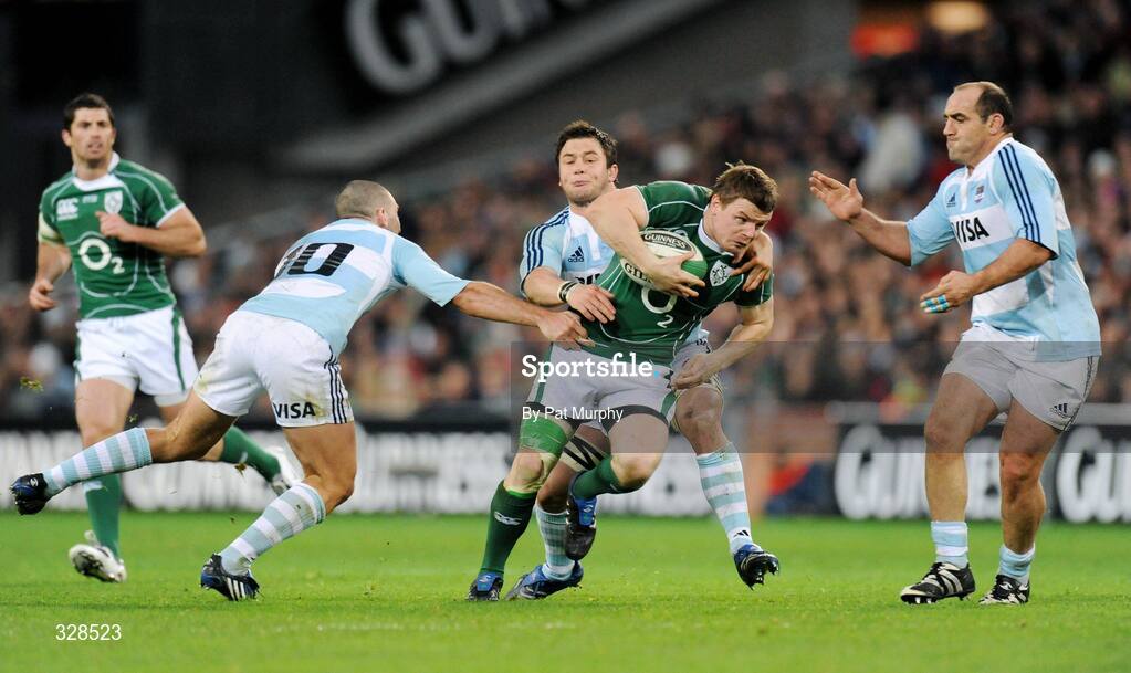 22 November 2008; Brian O'Driscoll, Ireland, in action against, from left, Agustin Figuerola, Martin Durand and Mario Ledesma, Argentina. Guinness Autumn Internationals, Ireland v Argentina, Croke Park, Dublin. Picture credit: Pat Murphy / SPORTSFILE