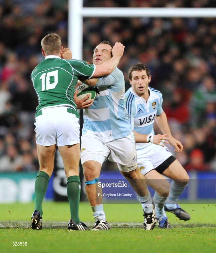 22 November 2008; Rodrigo Roncero, Argentina, leads with his fist when charging at Ronan O'Gara, Ireland. Guinness Autumn Internationals, Ireland v Argentina, Croke Park, Dublin. Picture credit: Stephen McCarthy / SPORTSFILE