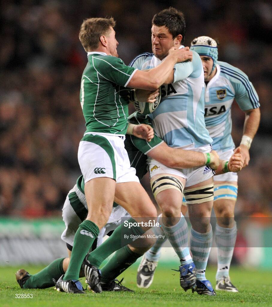 22 November 2008; Martin Durand, Argentina, is tackled by Ronan O'Gara and Marcus Horan, hidden, Ireland. Guinness Autumn Internationals, Ireland v Argentina, Croke Park, Dublin. Picture credit: Stephen McCarthy / SPORTSFILE
