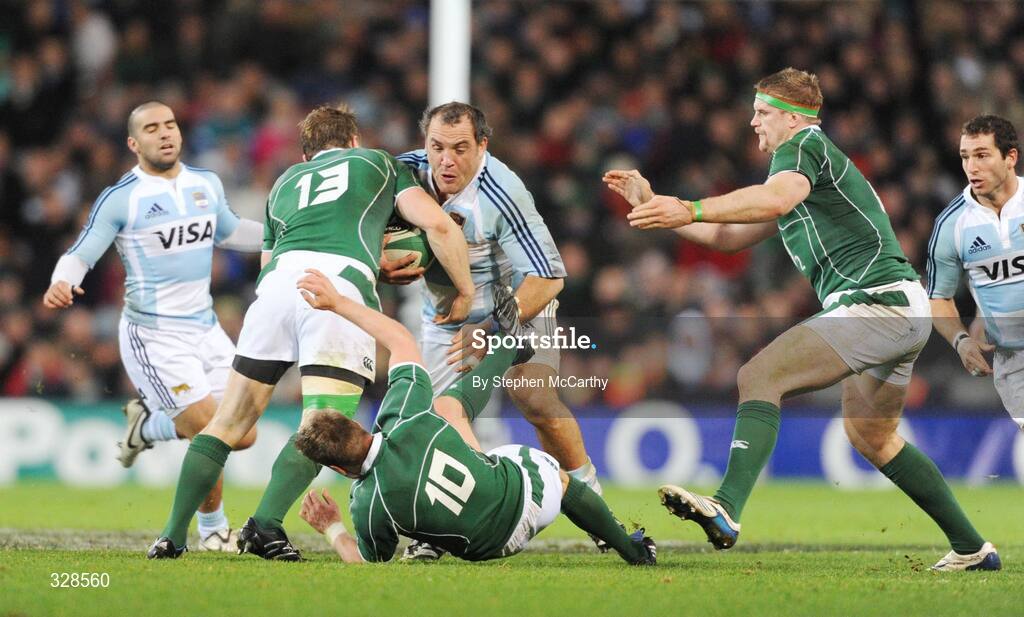 22 November 2008; Rodrigo Roncero, Argentina, is tackled by Ireland players, from left, Brian O'Driscoll, Ronan O'Gara and Jamie Heaslip. Guinness Autumn Internationals, Ireland v Argentina, Croke Park, Dublin. Picture credit: Stephen McCarthy / SPORTSFILE