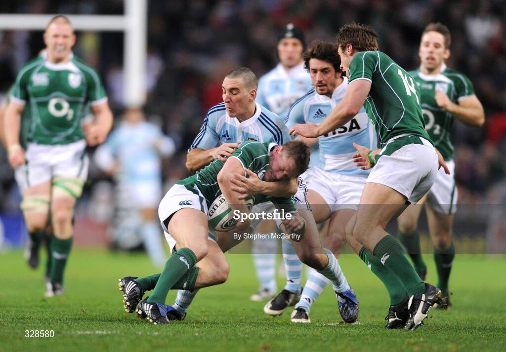 22 November 2008; Ronan O'Gara, Ireland, is tackled by Santiago Fernandez, Argentina. Guinness Autumn Internationals, Ireland v Argentina, Croke Park, Dublin. Picture credit: Stephen McCarthy / SPORTSFILE