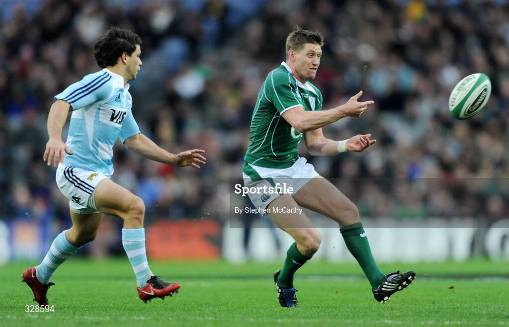 22 November 2008; Ronan O'Gara, Ireland, offloads the ball despite the attention of Nicolas Vergallo, Argentina. Guinness Autumn Internationals, Ireland v Argentina, Croke Park, Dublin. Picture credit: Stephen McCarthy / SPORTSFILE