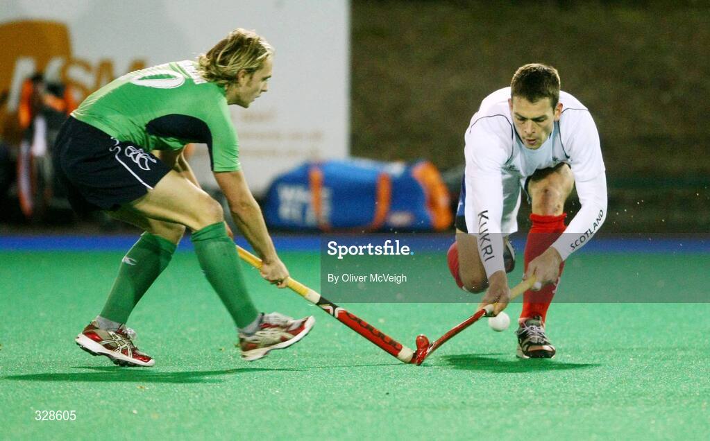 22 November 2008; Mitch Darling, Ireland, in action against Robert Barr, Scotland. Men's International, Ireland v Scotland, Banbridge Hockey Club, Banbridge, Co. Down. Picture credit: Oliver McVeigh / SPORTSFILE