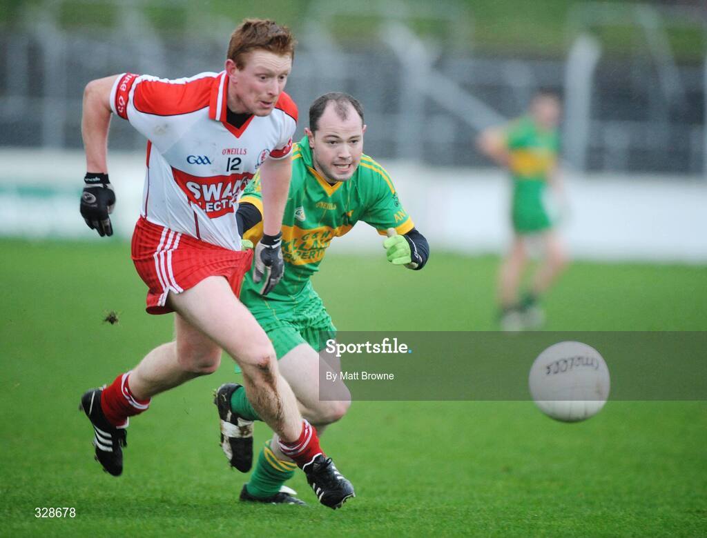 23 November 2008; Alan Byrne, Eire Og, in action against Garret Hickey, Rhode. AIB Leinster Senior Club Football Championship Semi-Final, Eire Og v Rhode, Dr. Cullen Park, Carlow. Picture credit: Matt Browne / SPORTSFILE
