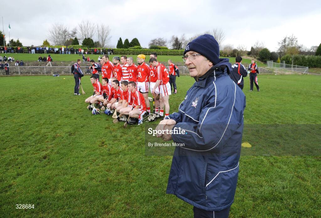 23 November 2008; Cork manager Gerald McCarthy looks on as his team prepare for a team photograph. Match to celebrate 150th Anniversary of St Colman's College, St Colman's XV v Cork Selection XV, Fitzgerald Park, Fermoy, Co. Cork. Picture credit: Brendan Moran / SPORTSFILE
