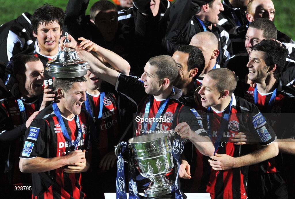 23 November 2008; Bohemians captain Owen Heary places the lid of the cup on Gary Deegan after winning the the FAI Ford Cup. Ford FAI Cup Final 2008, Bohemians v Derry City, RDS, Ballsbridge, Dublin. Picture credit: Stephen McCarthy / SPORTSFILE