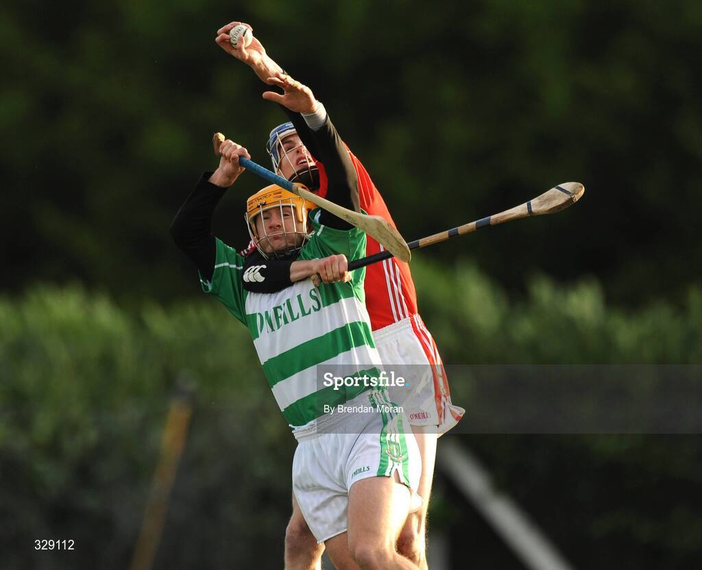23 November 2008; Michael Collins, Cork Selection XV, catches the sliotar ahead of James Murray, St Colman's XV. Match to celebrate 150th Anniversary of St Colman's College, St Colman's XV v Cork Selection XV, Fitzgerald Park, Fermoy, Co. Cork. Picture credit: Brendan Moran / SPORTSFILE