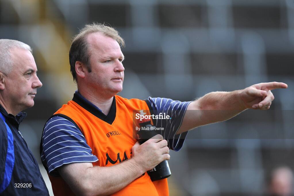 16 November 2008; Sarsfield's selector Teddy McCarthy, right, watches the game with manager Berti Og Murphy. AIB Munster Senior Club Hurling Championship Semi-Final, Sarsfields v De La Salle, Pairc Ui Chaoimh, Cork. Picture credit: Matt Browne / SPORTSFILE