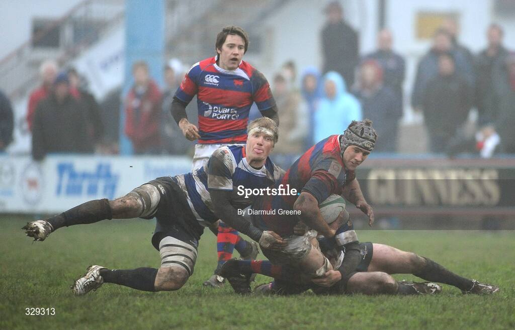 29 November 2008; Ben Reilly, Clontarf, is tackled by Jaydon Hill, Blackrock College. AIB League Division 1, Clontarf v Blackrock College, Castle Avenue, Clontarf, Dublin. Picture credit: Diarmuid Greene / SPORTSFILE