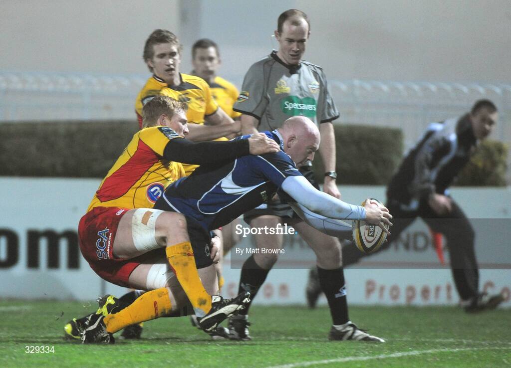 29 November 2008; Leinster's Bernard Jackman goes over for the second try despite the tackle of Newport Gwent Dragons' Jamie Ringer. Magners League, Leinster v Newport Gwent Dragons, RDS, Dublin. Picture credit: Matt Browne  / SPORTSFILE
