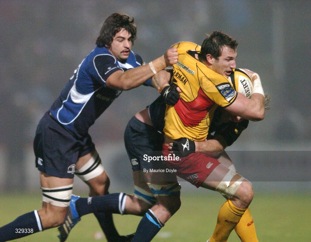 29 November 2008; Joe Bearman, Newport Gwent Dragons, is tackled by Cameron Jowitt, left, and Rocky Elsom, Leinster. Magners League, Leinster v Newport Gwent Dragons, RDS, Dublin. Picture credit: Maurice Doyle / SPORTSFILE
