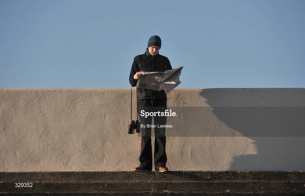 30 November 2008; A race fan studies the form during the day's racing. Fairyhouse Winter Festival 2008, Fairyhouse Racecourse, Co. Meath. Picture credit: Brian Lawless / SPORTSFILE