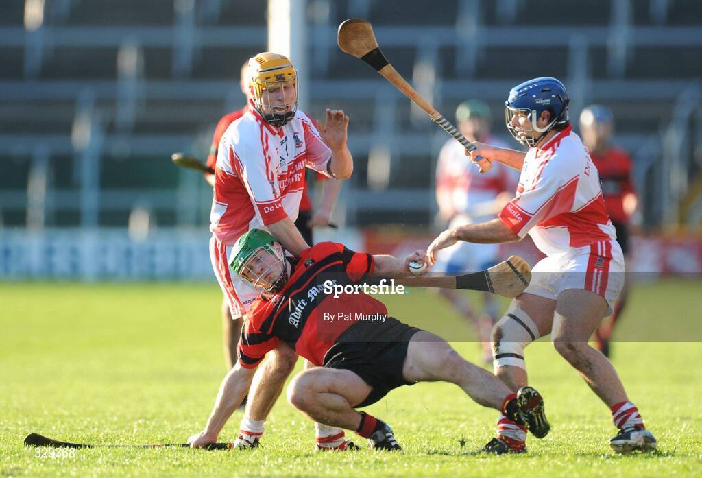 30 November 2008; Liam Costello, Adare, in action against, Paidi Nevin, left, and Conan Watt, De La Salle. AIB Munster Senior Club Hurling Championship Final, Adare v De La Salle, Semple Stadium, Thurles. Picture credit: Pat Murphy / SPORTSFILE