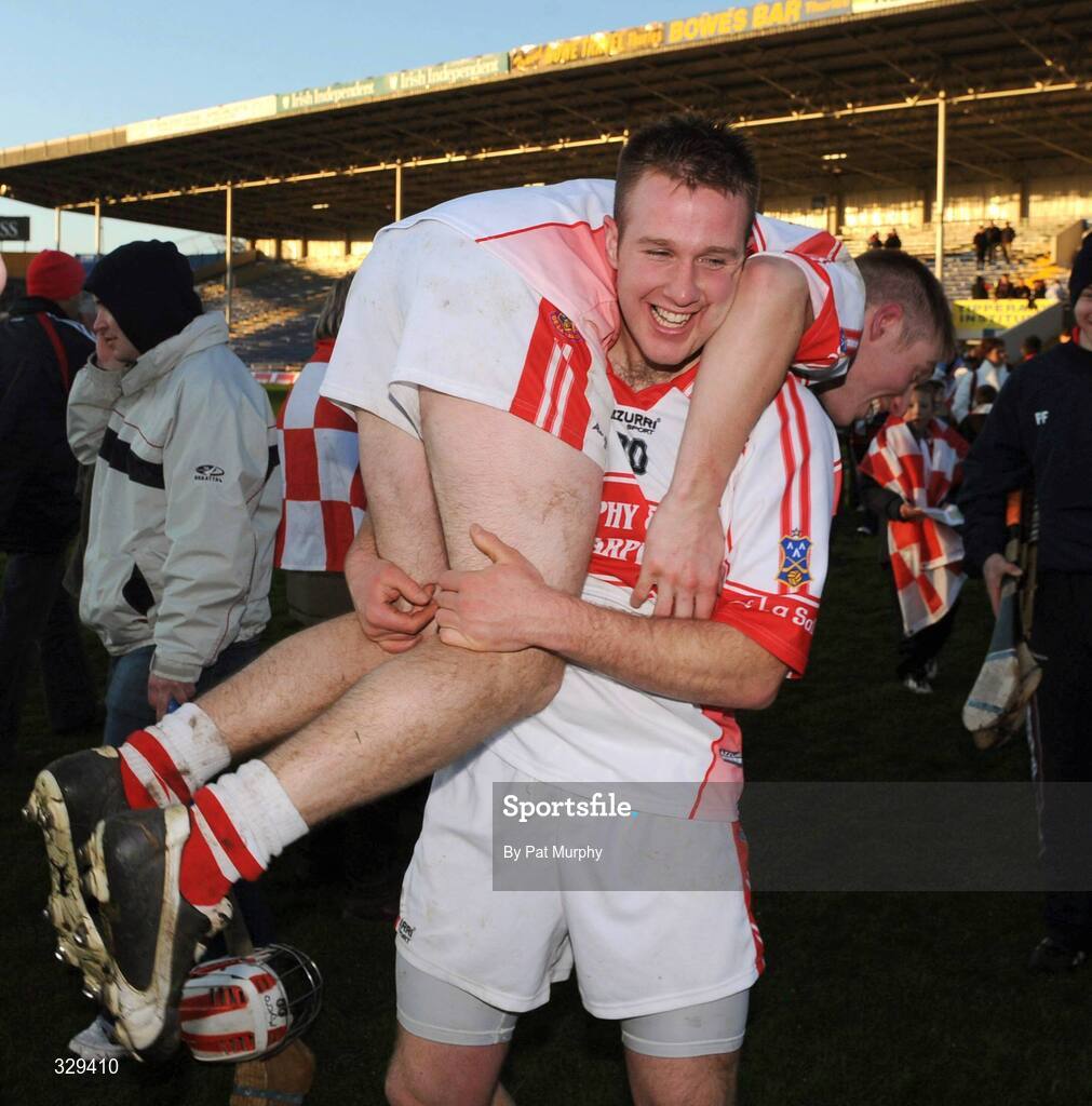 30 November 2008; De La Salle's Thomas Kearney holds team-mate Paidi Nevin on his shoulder in celebration. AIB Munster Senior Club Hurling Championship Final, Adare v De La Salle, Semple Stadium, Thurles. Picture credit: Pat Murphy / SPORTSFILE