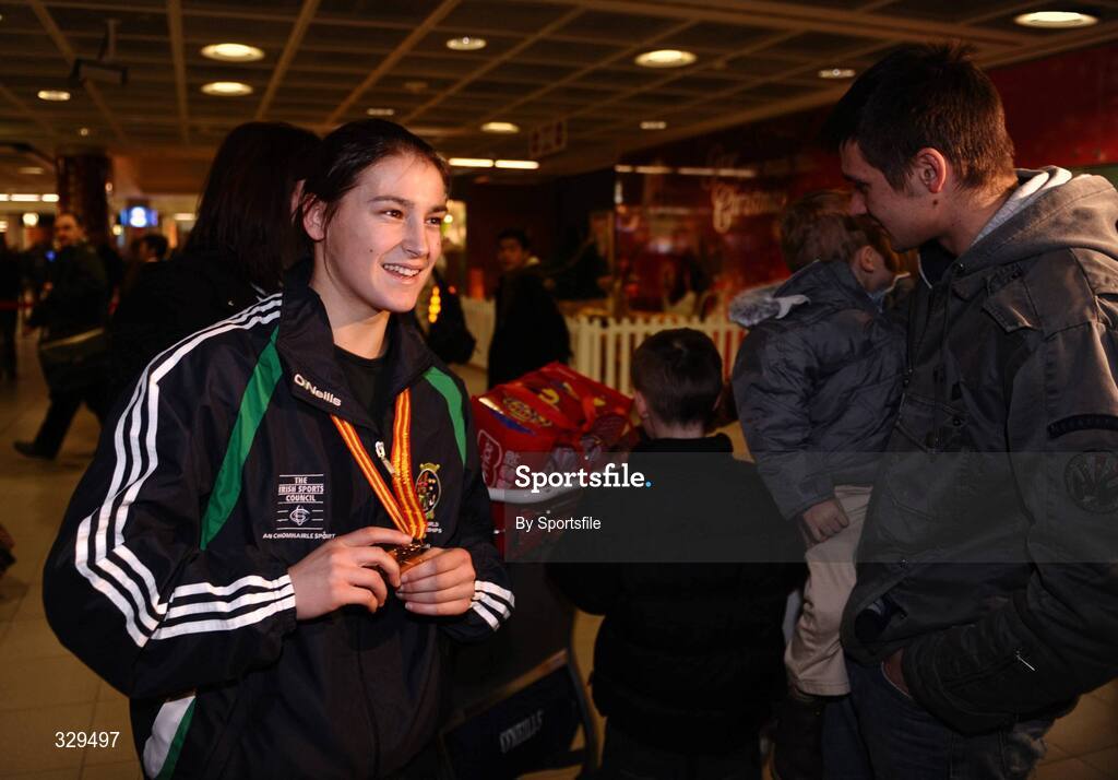 1 December 2008; Ireland's Katie Taylor, who won a gold medal in the 60kg category at the AIBA Women's World Championships in China, at the homecoming in Dublin Airport. Photo by Sportsfile