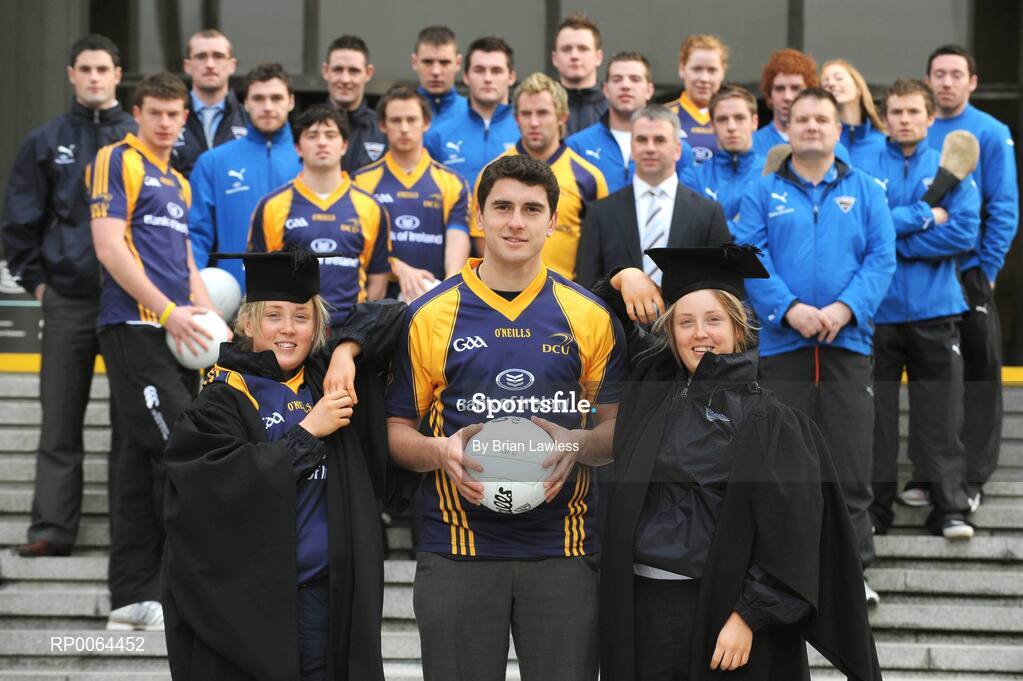 26 November 2008; Bank of Ireland announced that it has signed an agreement to become the new official sponsor of the DCU GAA Academy. The five-year deal commences immediately and will see the Bank of Ireland brand arrive on players and grounds in the coming weeks The DCU GAA Academy was established in 2006 to provide elite level Gaelic footballers and hurlers with the opportunity to develop their sporting and academic careers in a supportive environment. At the announcement are members of the DCU GAA Academy including Dublin footballer Bernard Brogan with Monaghan ladies footballers Aoife, left, and Ciara McAnespie with Gabriel Bannigan, Director Retail Strategy & Marketing, Bank of Ireland, second row second from right. Bank of Ireland Head Office, Dublin. Picture credit: Brian Lawless / SPORTSFILE