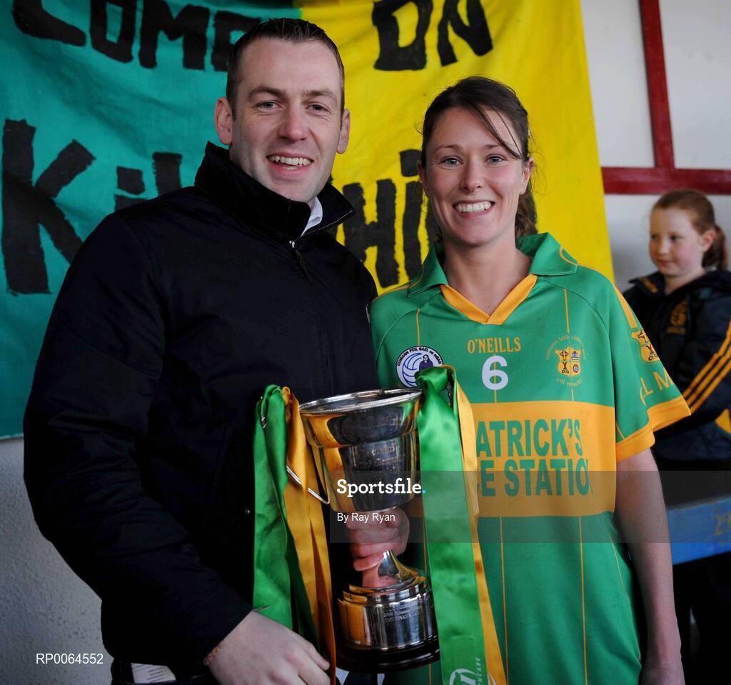 29 November 2008; VHI Healthcare Account Manager Mark Gilmore with Kilmihil captain Fiona O'Neill after the match. VHI Healthcare All-Ireland Ladies Junior Club Football Championship Final, Kilmihil, Clare, v Knockmore, Mayo. Tuam Stadium, Tuam, Co. Galway. Picture credit: Ray Ryan / SPORTSFILE