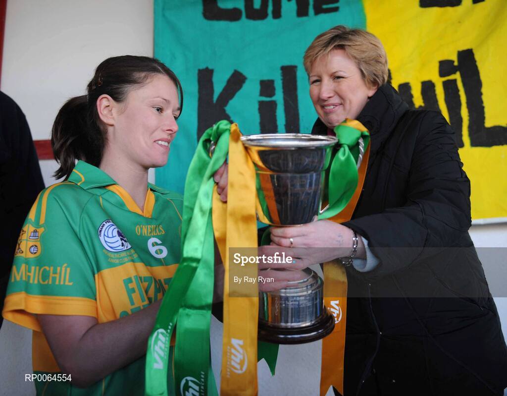 29 November 2008; Kilmihil captain Fiona O'Neill is presented with the cup by Geraldine Giles, President of Cumann Peil na mBan. VHI Healthcare All-Ireland Ladies Junior Club Football Championship Final, Kilmihil, Clare, v Knockmore, Mayo. Tuam Stadium, Tuam, Co. Galway. Picture credit: Ray Ryan / SPORTSFILE
