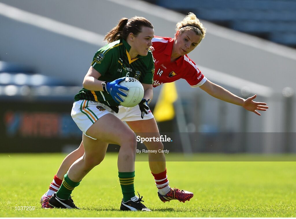 3 August 2015; Paula Dunne, Meath, in action against Valerie Mulcahy, Cork. TG4 Ladies Football All-Ireland Senior Championship, Qualifier Round 2, Cork v Meath. Semple Stadium, Thurles, Co. Tipperary. Picture credit: Ramsey Cardy / SPORTSFILE