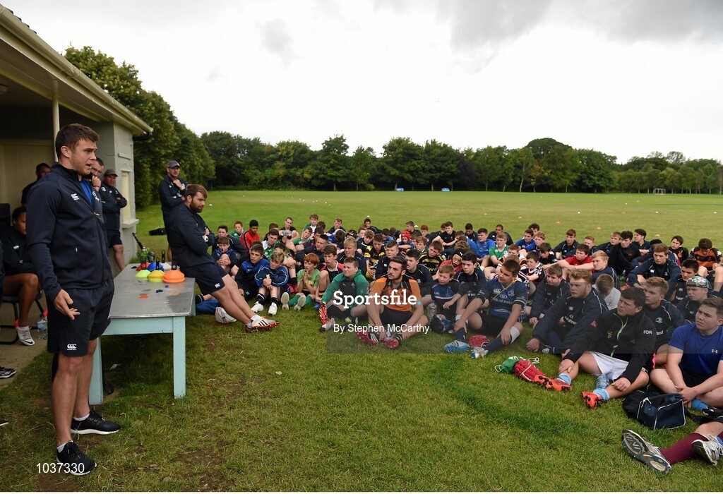 5 August 2015; Leinster Rugby's Ross Byrne and Tom Farrell visited the Bank of Ireland School of Excellence to talk to developing players about training, tips and their and their development as rugby players. King's Hospital, Palmerstown, Dublin Picture credit: Stephen McCarthy / SPORTSFILE