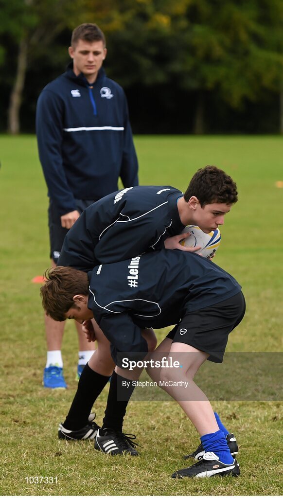 5 August 2015; Leinster Rugby's Ross Byrne visited the Bank of Ireland School of Excellence to talk to developing players about training, tips and their development as rugby players. King's Hospital, Palmerstown, Dublin. Picture credit: Stephen McCarthy / SPORTSFILE