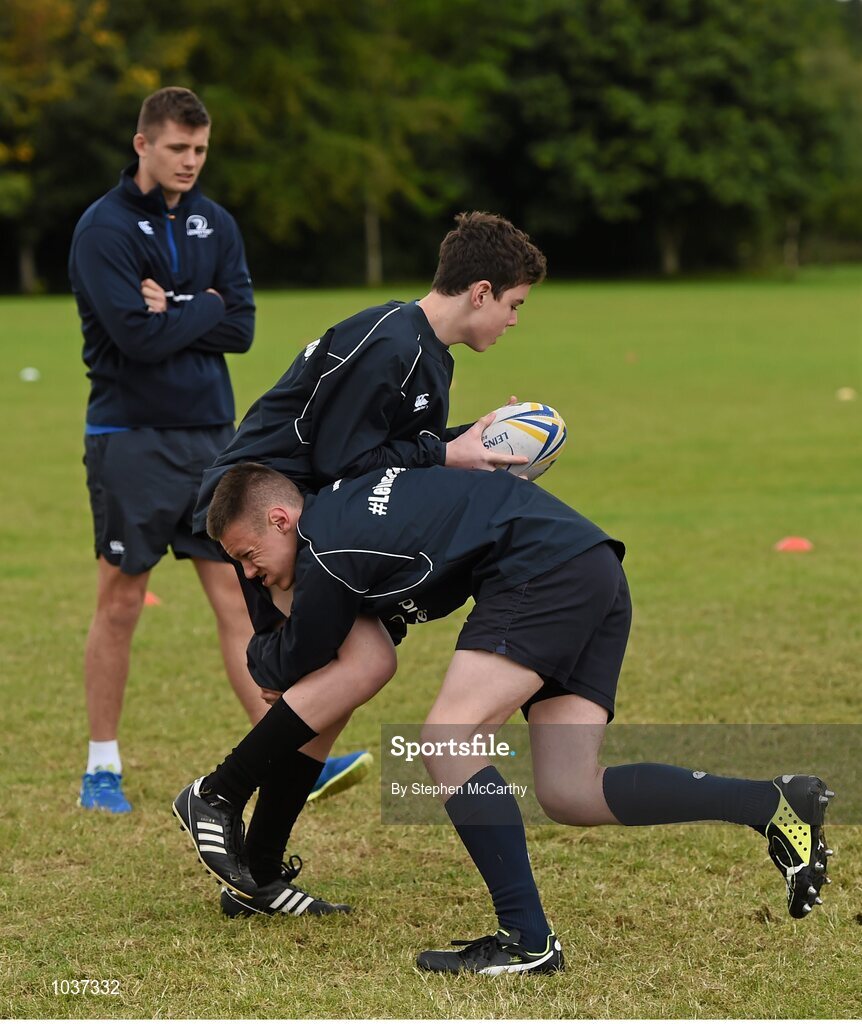 5 August 2015; Leinster Rugby's Ross Byrne visited the Bank of Ireland School of Excellence to talk to developing players about training, tips and their development as rugby players. King's Hospital, Palmerstown, Dublin. Picture credit: Stephen McCarthy / SPORTSFILE