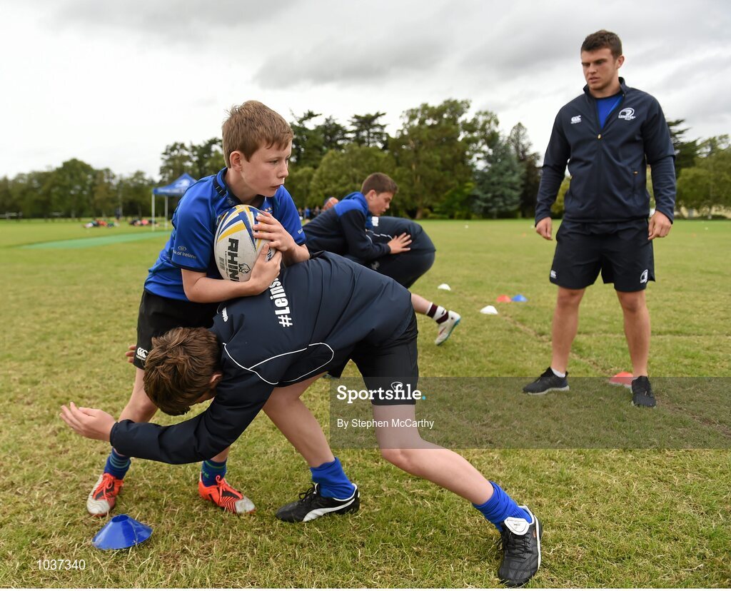5 August 2015; Leinster Rugby's Ross Byrne visited the Bank of Ireland School of Excellence to talk to developing players about training, tips and their development as rugby players. King's Hospital, Palmerstown, Dublin. Picture credit: Stephen McCarthy / SPORTSFILE