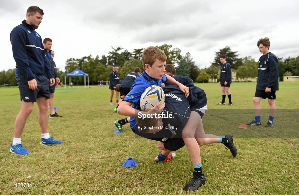 5 August 2015; Leinster Rugby's Ross Byrne visited the Bank of Ireland School of Excellence to talk to developing players about training, tips and their development as rugby players. King's Hospital, Palmerstown, Dublin. Picture credit: Stephen McCarthy / SPORTSFILE