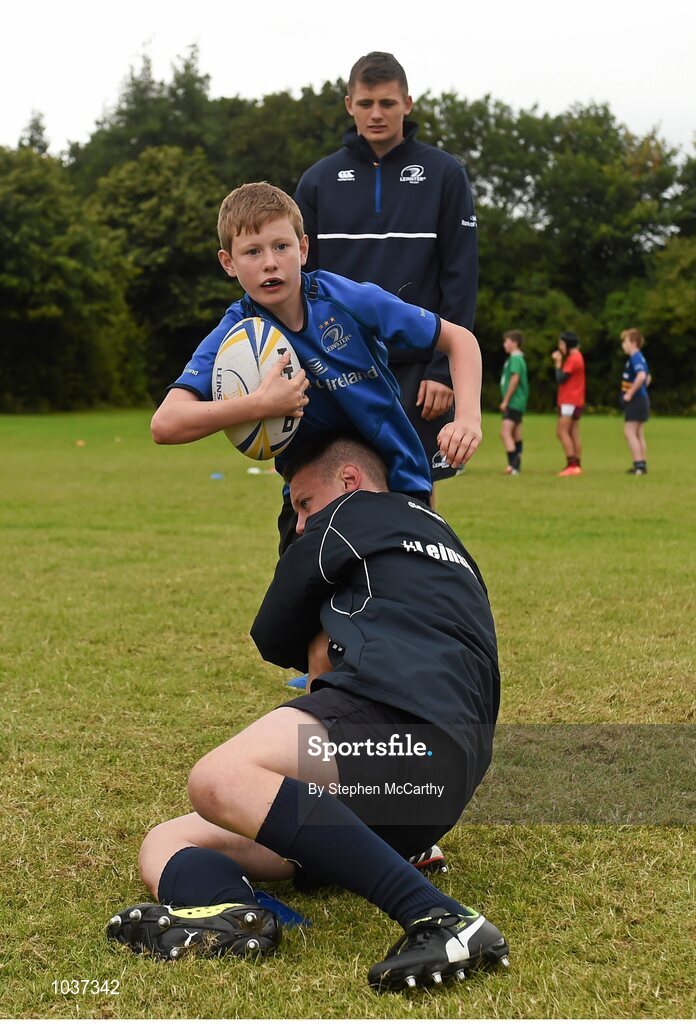 5 August 2015; Leinster Rugby's Ross Byrne visited the Bank of Ireland School of Excellence to talk to developing players about training, tips and their development as rugby players. King's Hospital, Palmerstown, Dublin. Picture credit: Stephen McCarthy / SPORTSFILE