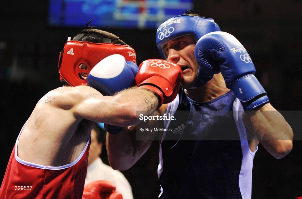 10 August 2008; John Joe Joyce, Ireland, in action against Gyula Kate, right, Hungary, during the 'Round of 32' Light Welter, 64 kg, contest. Beijing 2008 - Games of the XXIX Olympiad, Beijing Workers Gymnasium, Olympic Green, Beijing, China. Picture credit: Ray McManus / SPORTSFILE