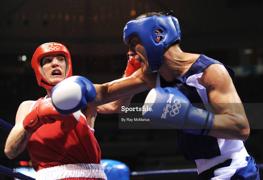10 August 2008; John Joe Joyce, Ireland, in action against Gyula Kate, blue, Hungary, during the 'Round of 32' Light Welter, 64 kg, contest. Beijing 2008 - Games of the XXIX Olympiad, Beijing Workers Gymnasium, Olympic Green, Beijing, China. Picture credit: Ray McManus / SPORTSFILE