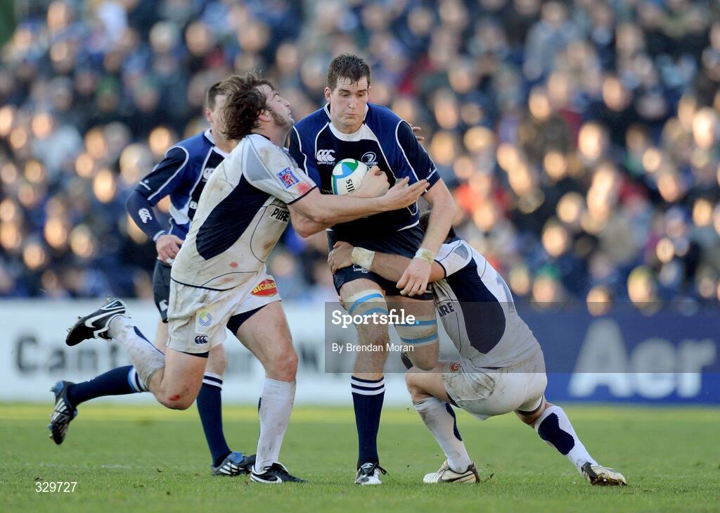 6 December 2008; Devin Toner, Leinster, is tackled by Florian Faure, left, and Anthony Lagardere, Castres Olympique. Heineken Cup, Pool 2, Round 3, Leinster v Castres Olympique, RDS, Dublin. Picture credit: Brendan Moran / SPORTSFILE