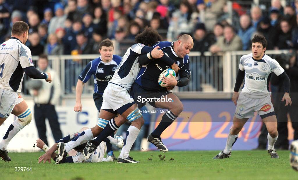6 December 2008; CJ Van Der Linde, Leinster, is tackled by Steve Malonga, Castres Olympique. Heineken Cup, Pool 2, Round 3, Leinster v Castres Olympique, RDS, Dublin. Picture credit: Brendan Moran / SPORTSFILE