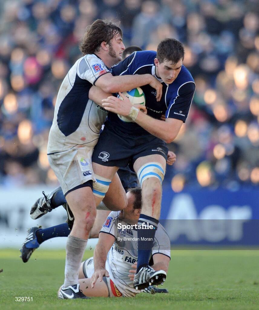 6 December 2008; Devin Toner, Leinster, is tackled by Florian Faure, left, and Anthony Lagardere, Castres Olympique. Heineken Cup, Pool 2, Round 3, Leinster v Castres Olympique, RDS, Dublin. Picture credit: Brendan Moran / SPORTSFILE