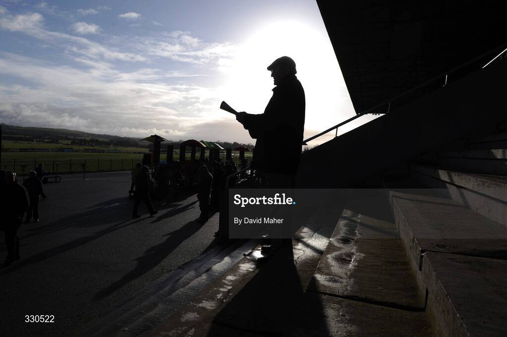 9 December 2008; A punter studies his race card before the start of racing. Punchestown Racecouse, Naas, Co. Kildare. Picture credit: David Maher / SPORTSFILE
